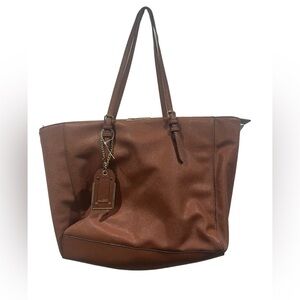ALDO leather brown shoulder purse woman it just have a slight rip on the handle